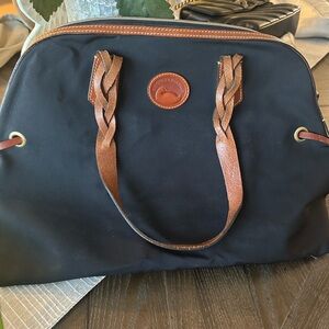 Dooney and Bourke Black and Brown Duffel Bag with Leather Handles